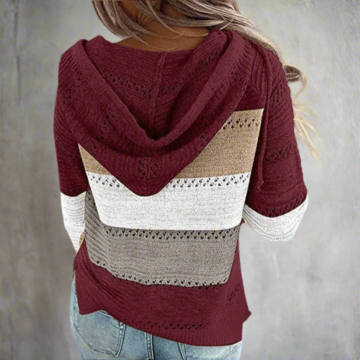 Damski sweter z wzorem w patchworkowe pasy i dekoltem V