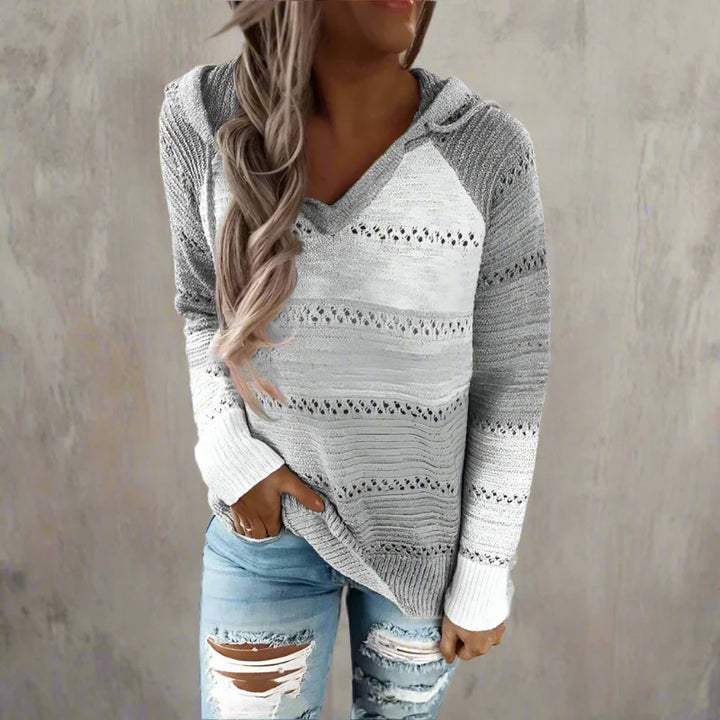 Damski sweter z wzorem w patchworkowe pasy i dekoltem V